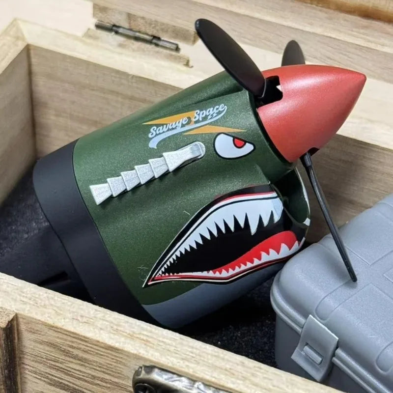 P-40 fighter car air freshener, tribute to mechanical classics. Eye-catching propeller design, ideal gift.