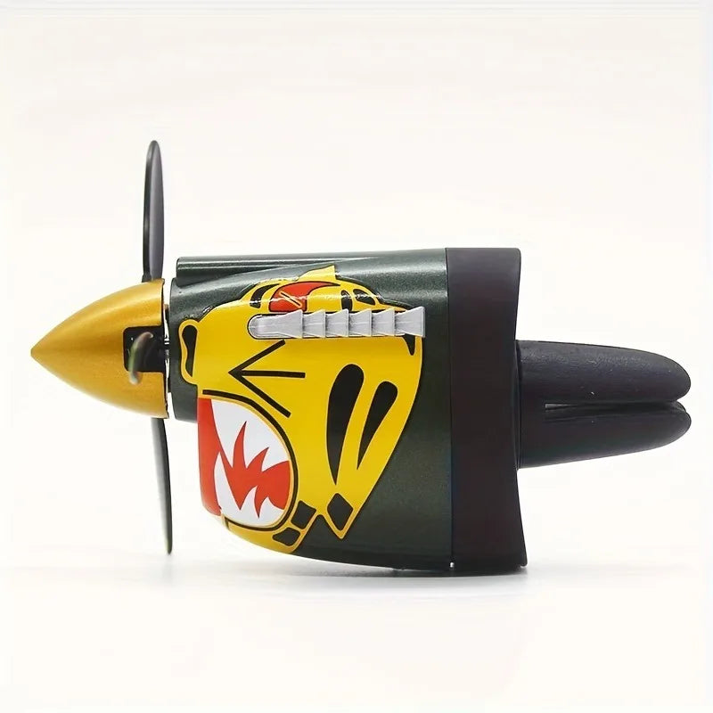 P-40 fighter car air freshener, tribute to mechanical classics. Eye-catching propeller design, ideal gift.