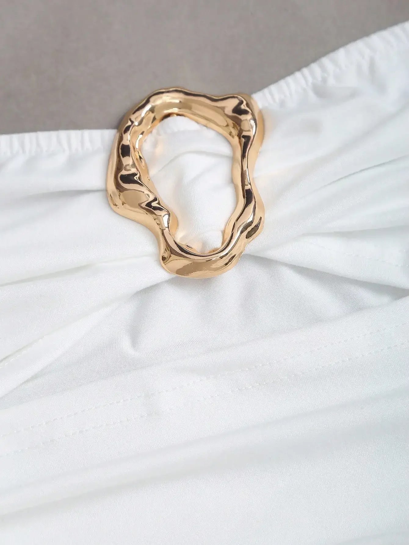 Ruched Strapless Mini Dress With Cutout Waist And Ornamental Metal Ring